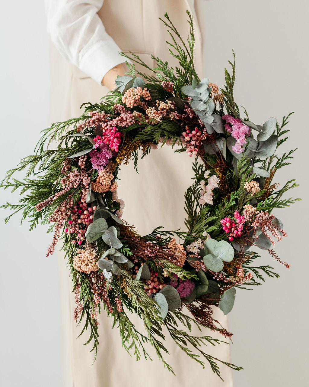 corona decoración flores rosadas navidad adviento preservadas