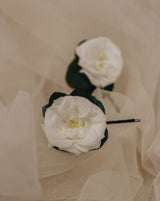 horquillas flor rosa blanca