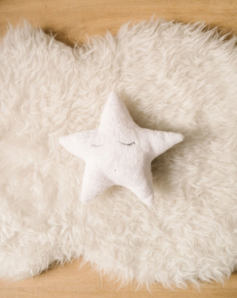 jabón, cremita y peluche bebé