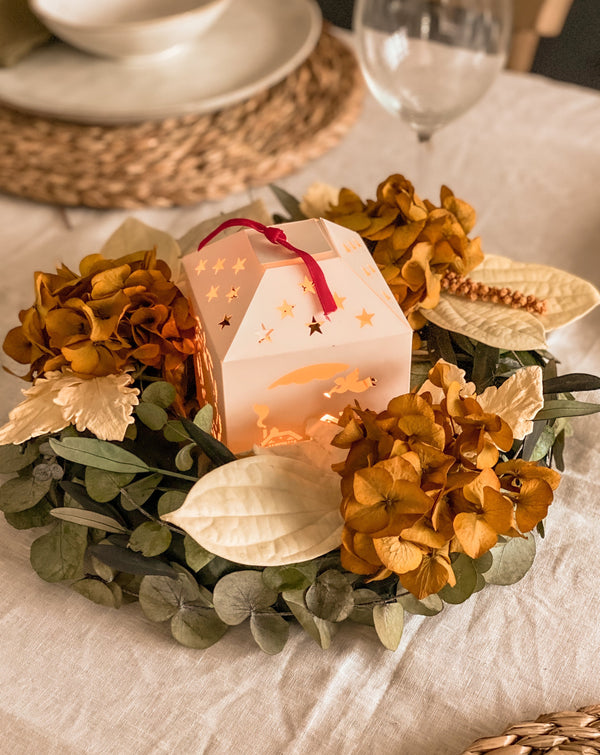 Farolito navideño con vela
